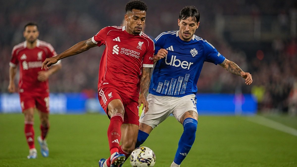 Liverpool vs Como players compete for the ball during a football match